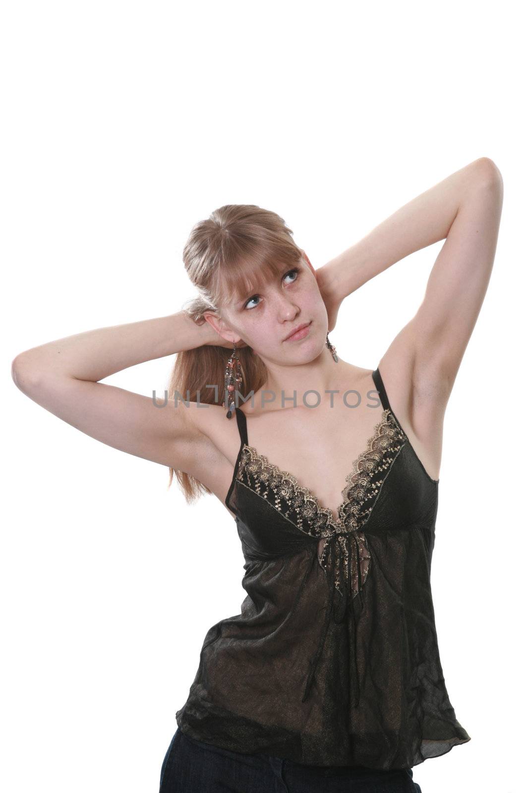 The young woman poses on a white background