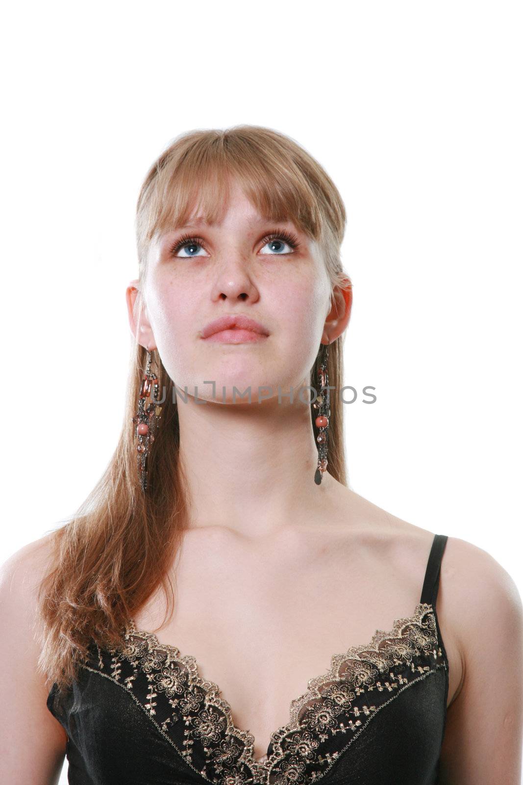 The young woman poses on a white background