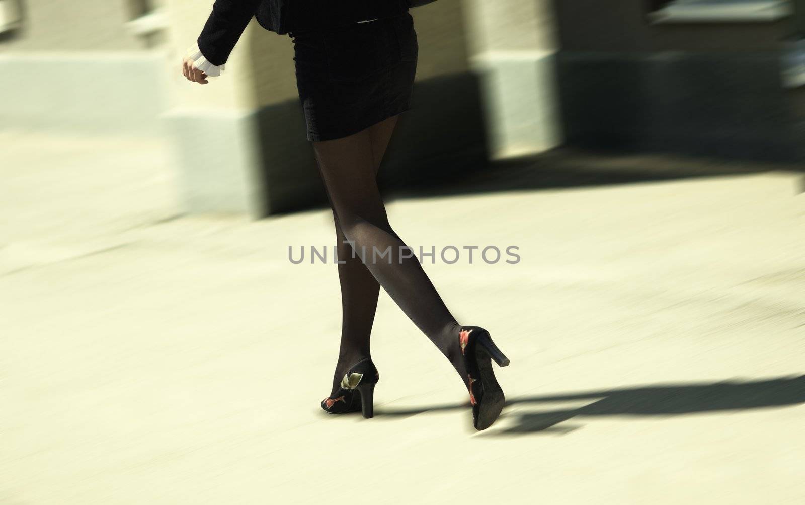 slim girl going on the street