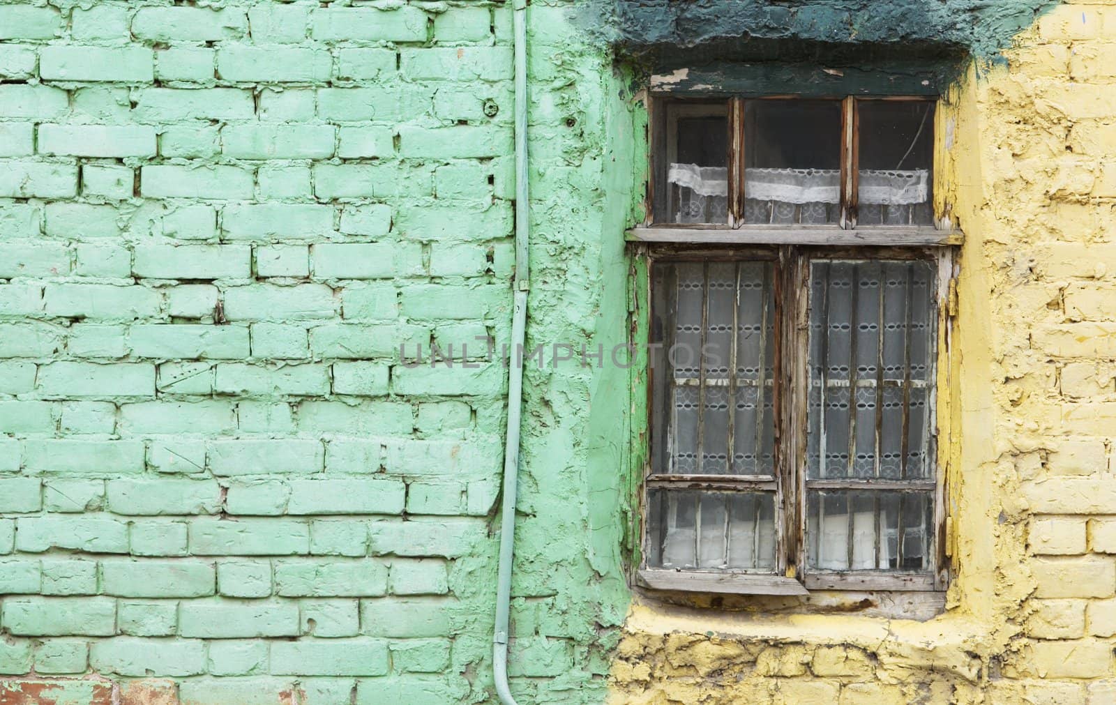 vintage window with green wall