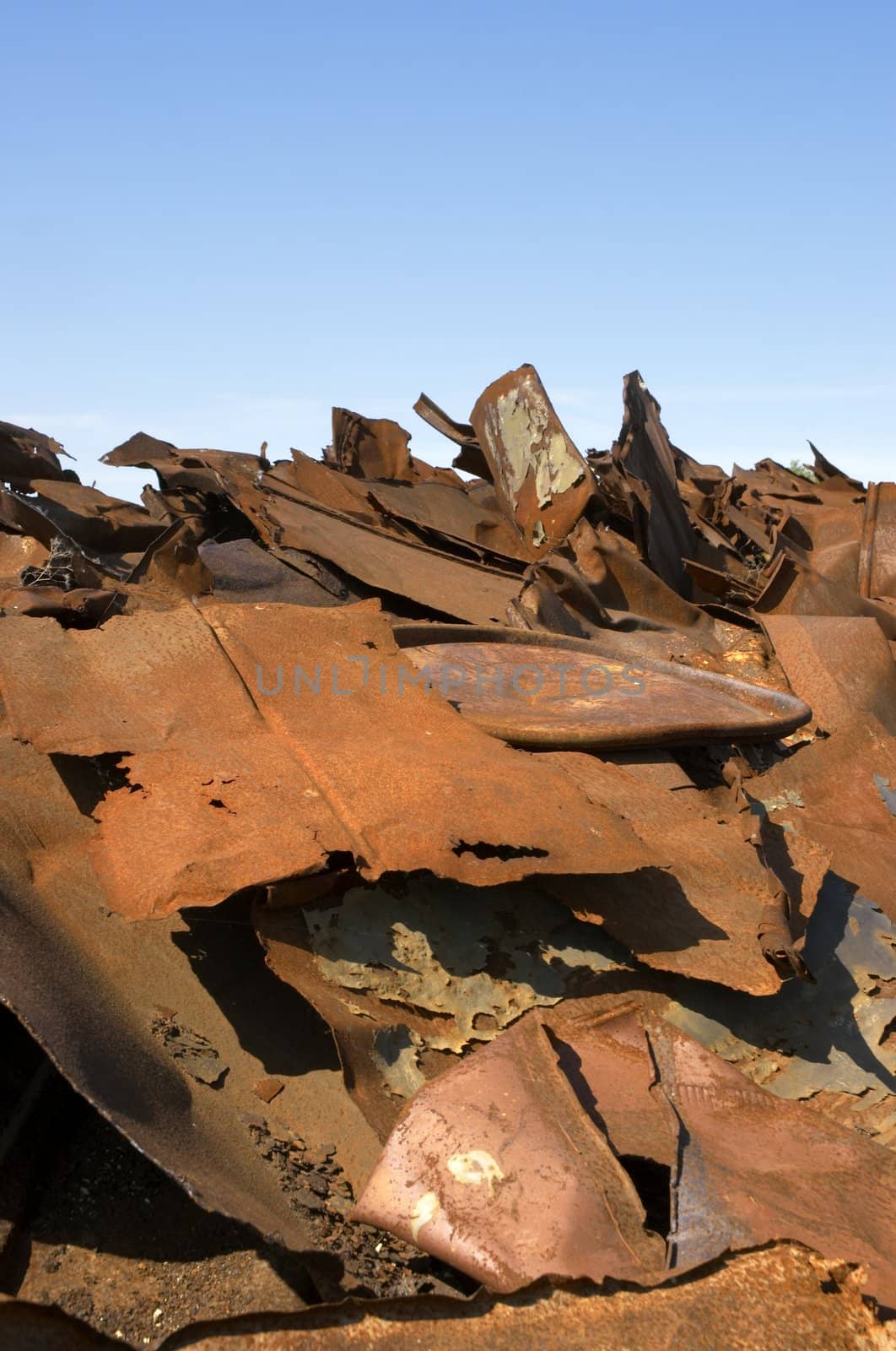 iron garbage and blue sky