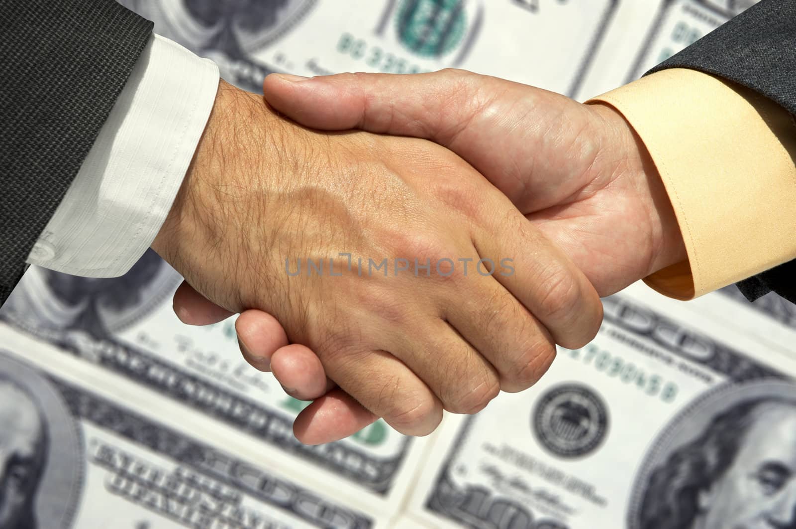 Two businessmen shaking hands 