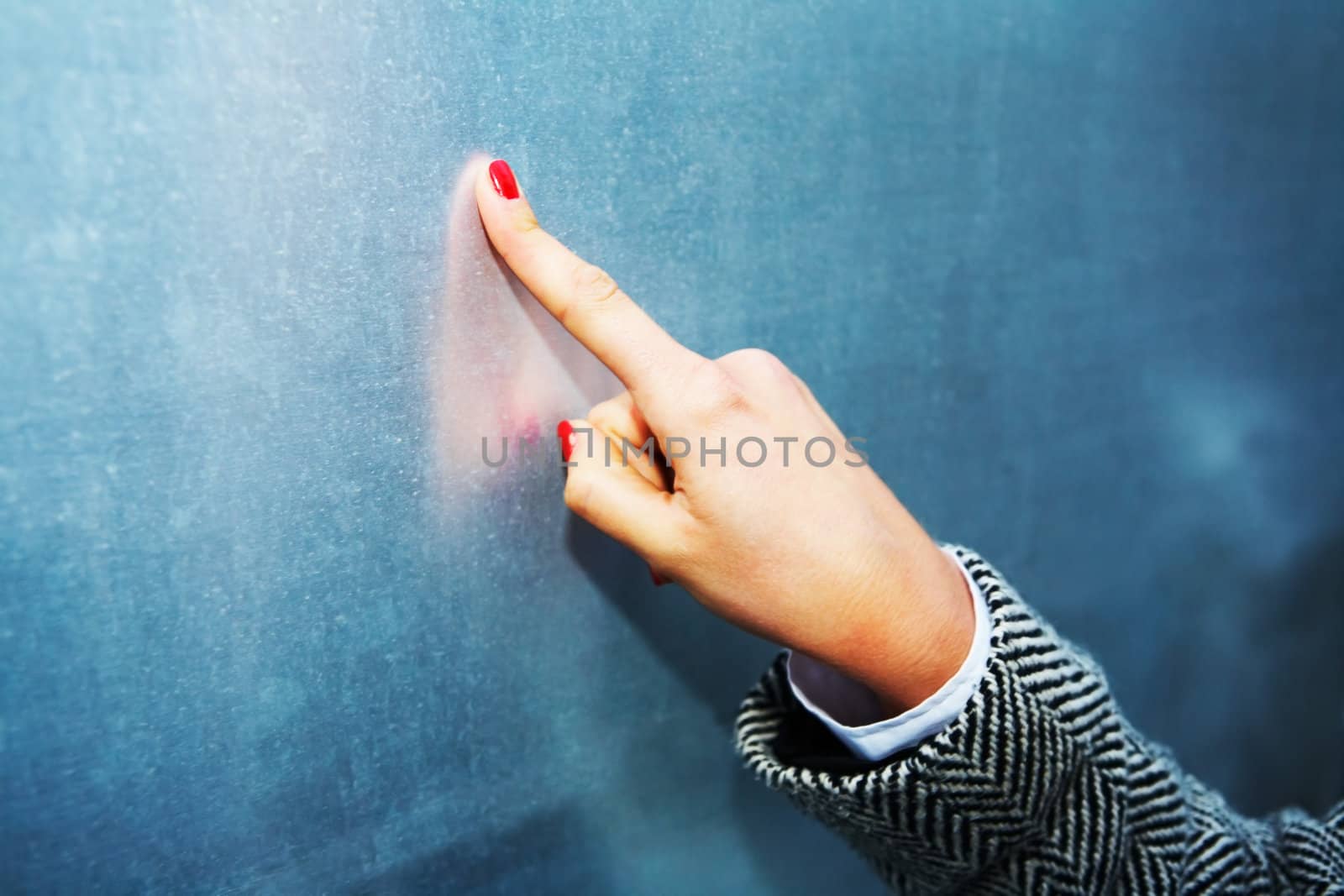 Close-up of finger of young woman