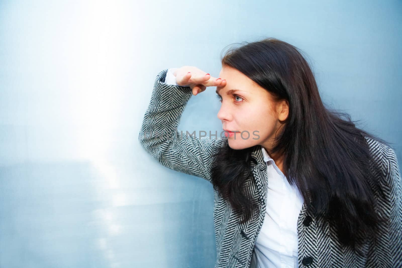 Young woman looking far away