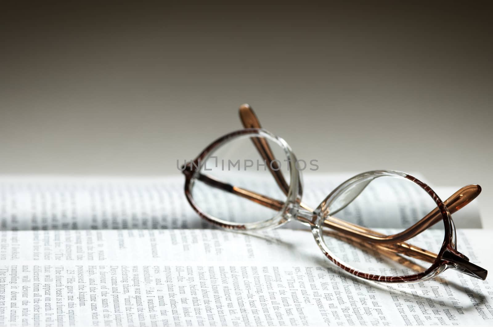 eye-glasses on the text