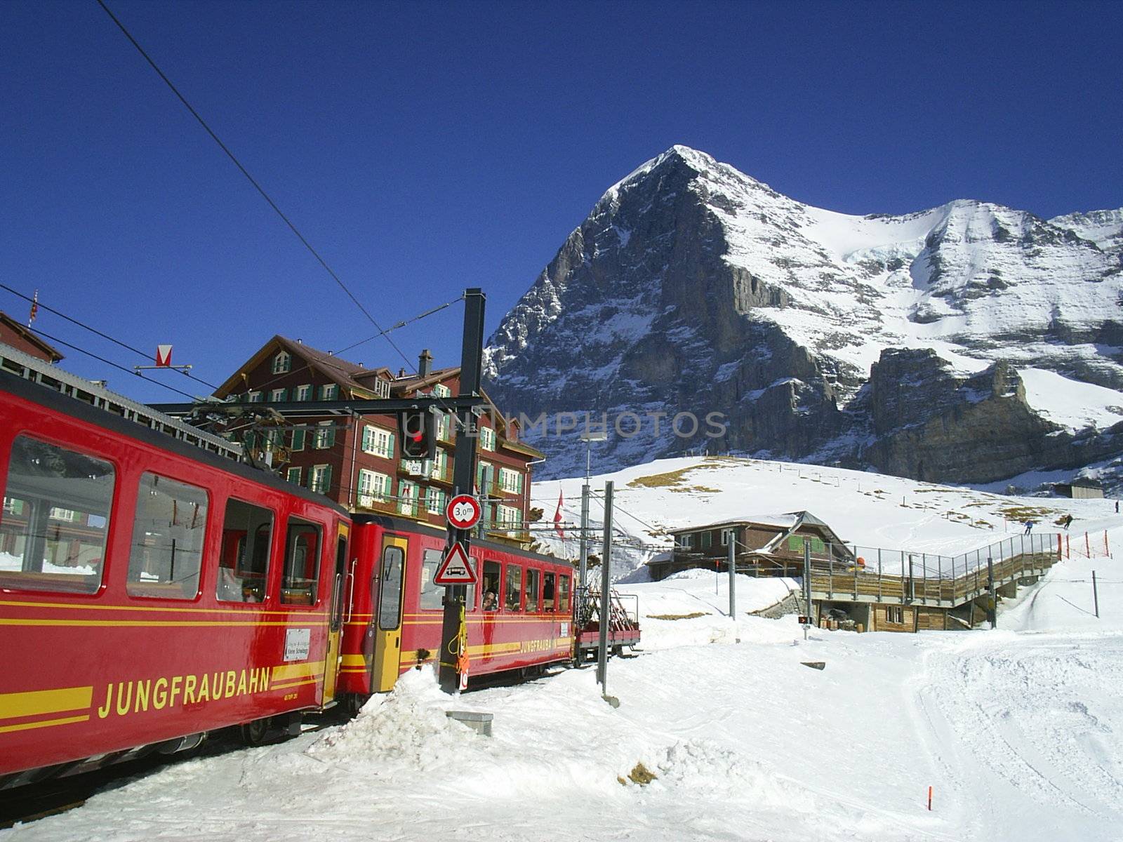 The Jungfraubahn train in front of the Eiger at Kleine Scheidegg