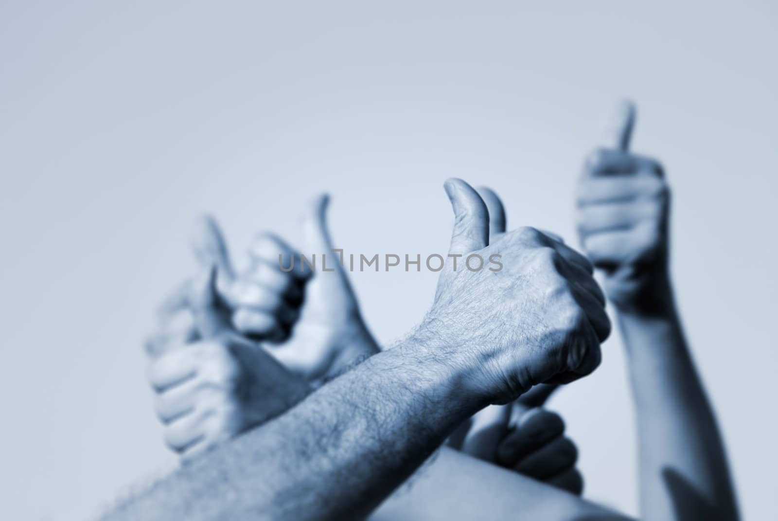 hands of the people with OK signs (special toned,focus point on nearest hand of the man)