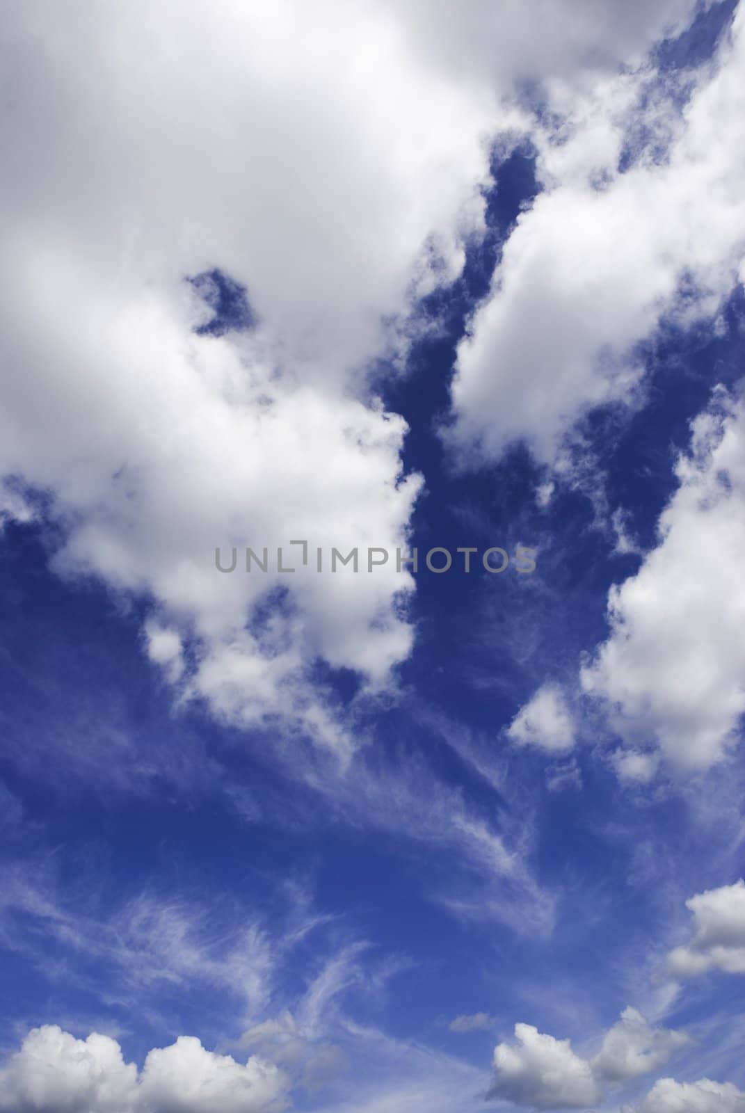 summer clouds in windy day,special photo f/x, focus point on the center