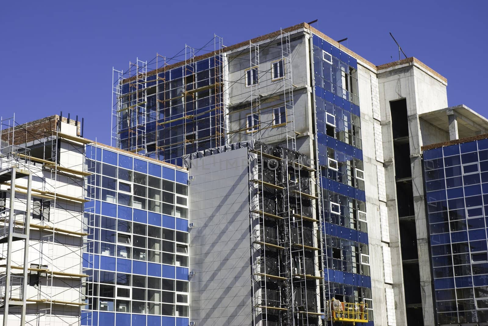 ofice building under construction, focus point on the center of photo