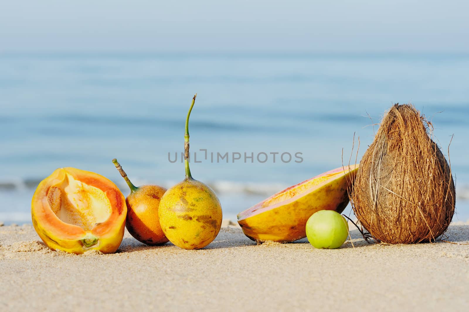 Exotic tropical fruit on the sandy beach