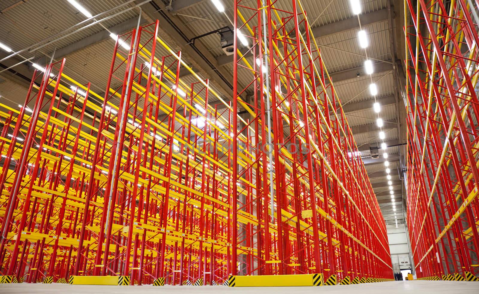 empty racks in warehouse by vilevi