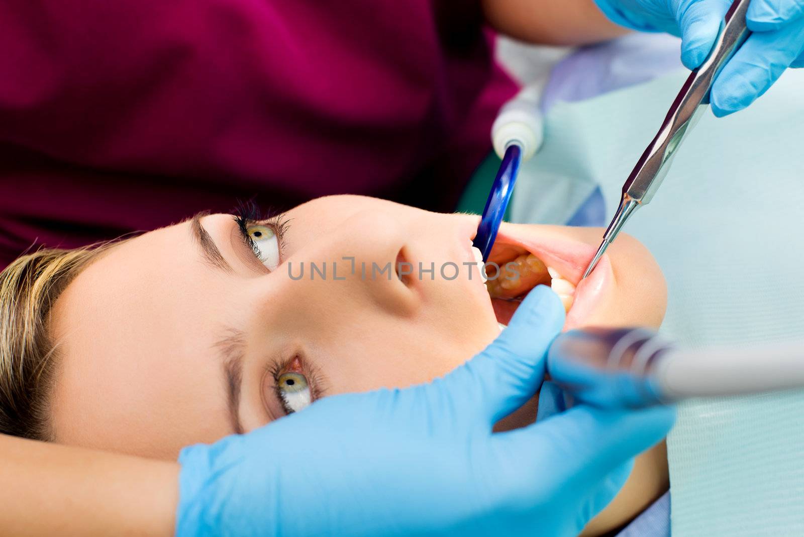 dentist working patient by vilevi