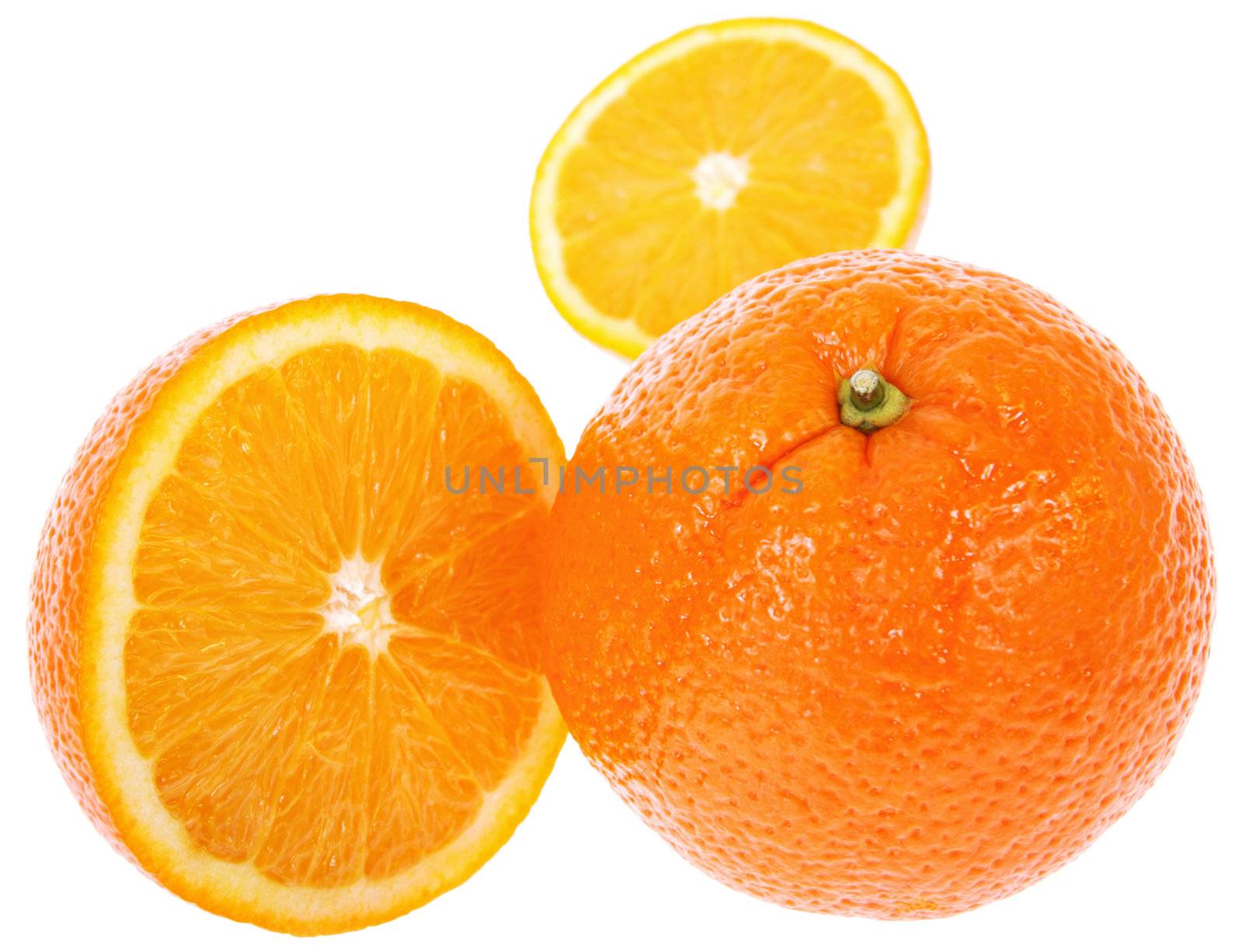 Fresh oranges. Two cut on half. Isolated on white background.