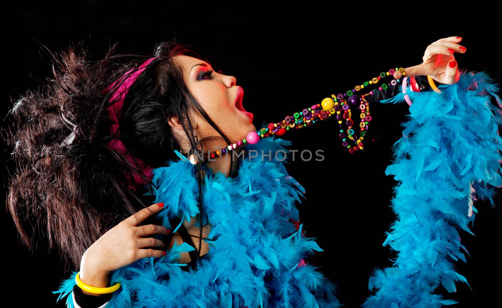 gipsy like female posing profile portrait with blue boa