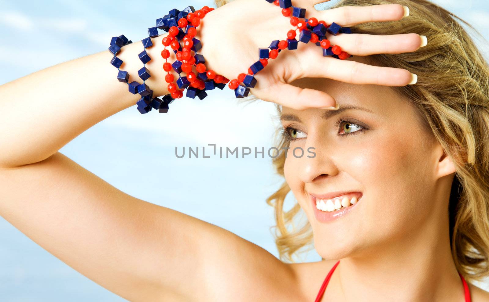 portrait of beautiful blonde woman under bright light