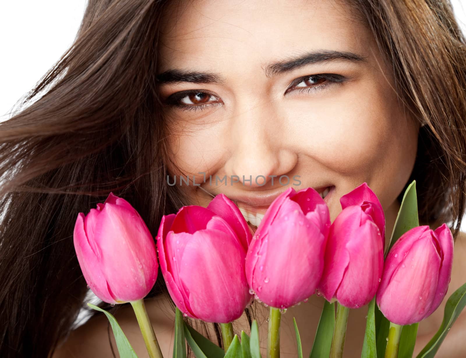 Female holding tulips by vilevi