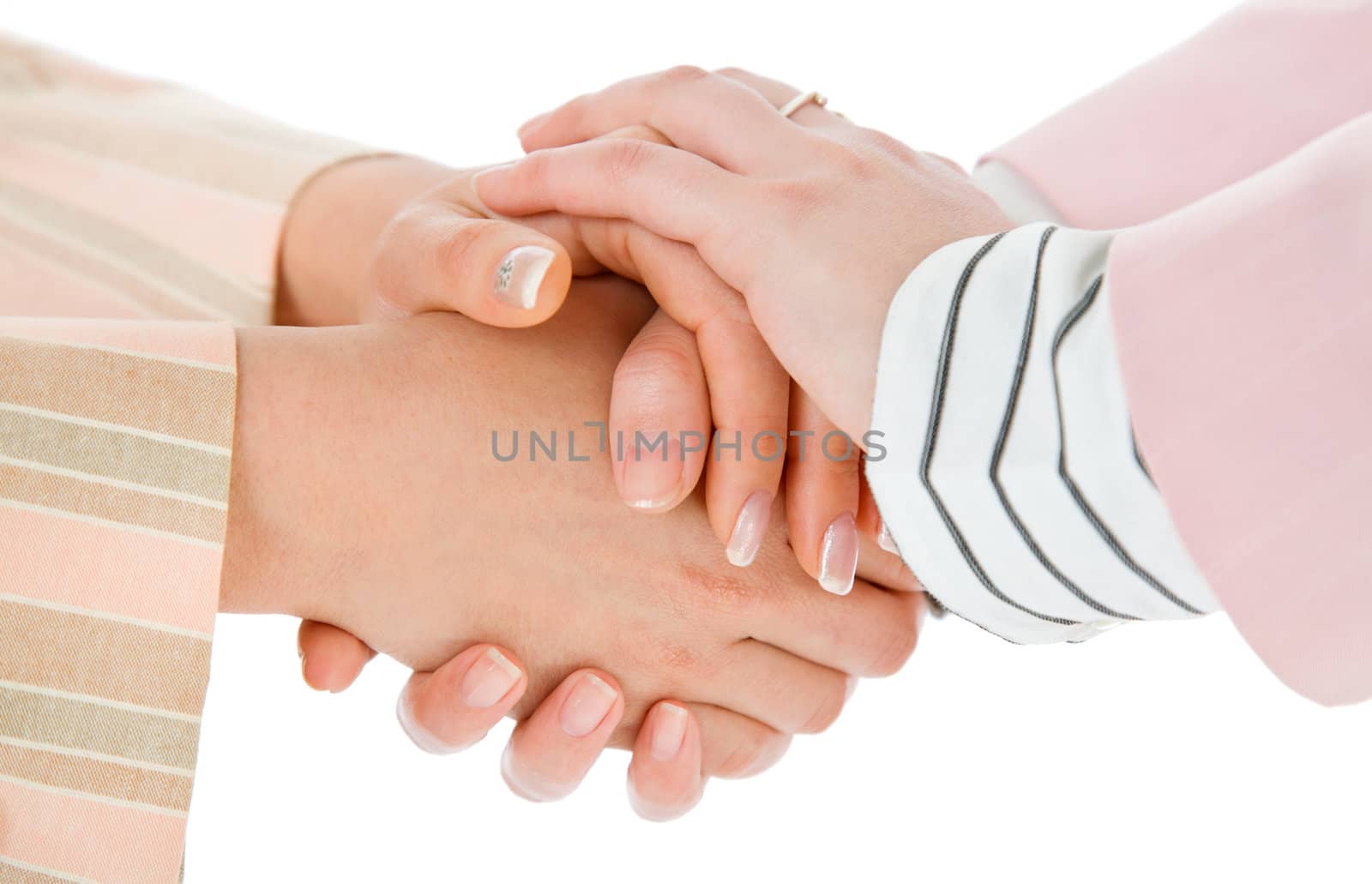 Close-up of four female handshaking hands, isolated on white