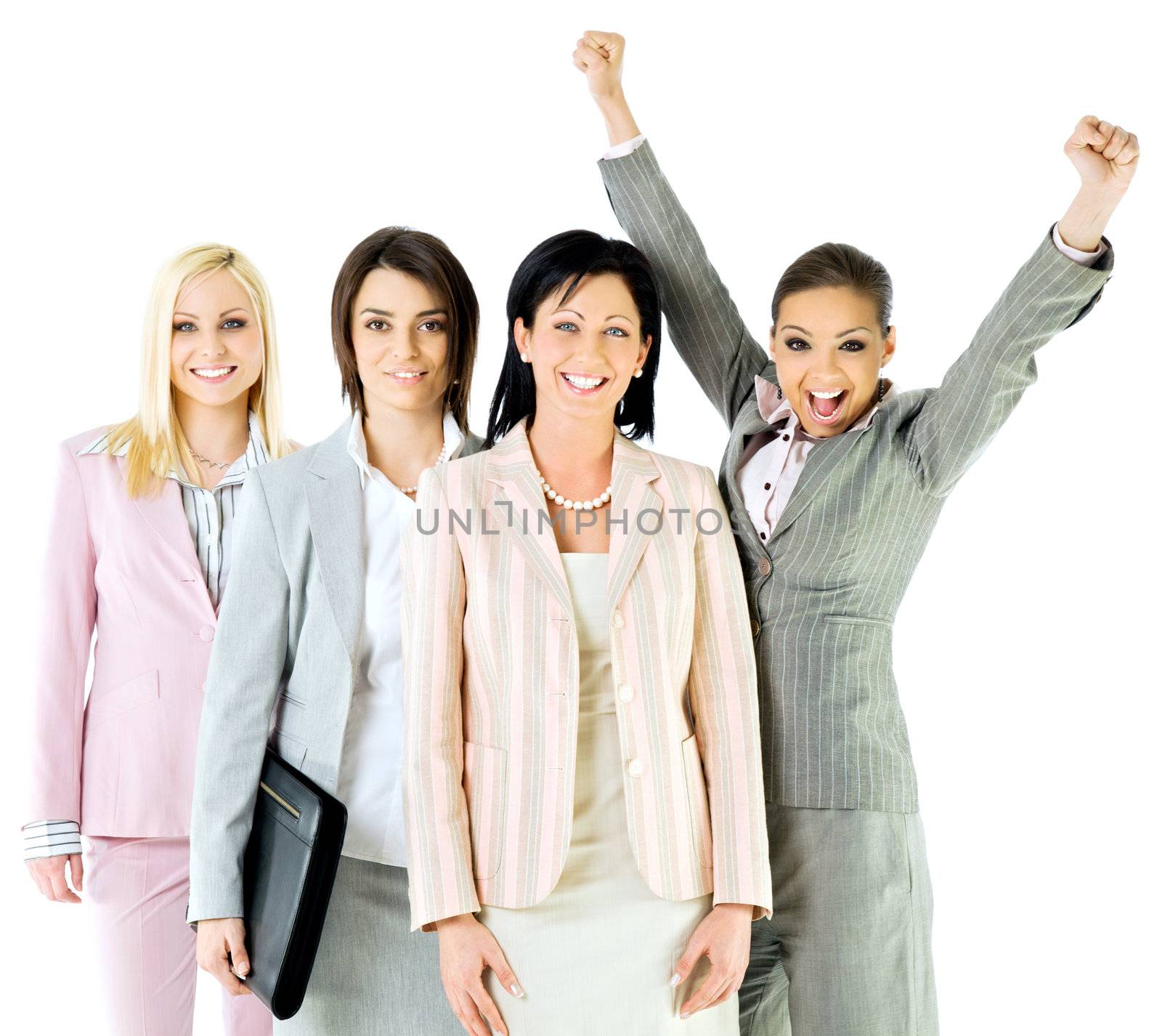 Four successful businesswomen smiling at camera, one with raised arms, isolated