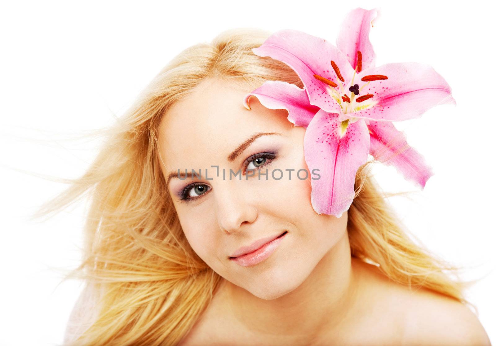portrait of a beautiful young blond female with lilium