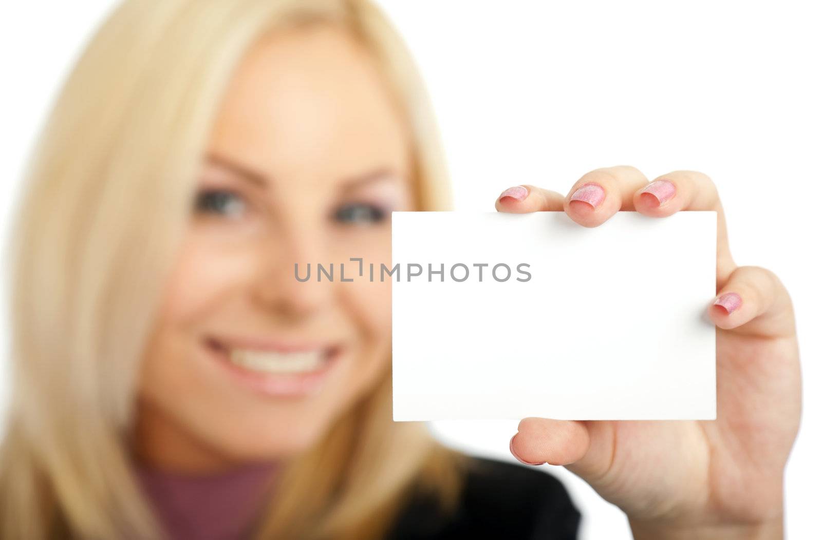 positive blond female out of focus presenting blank businesscard