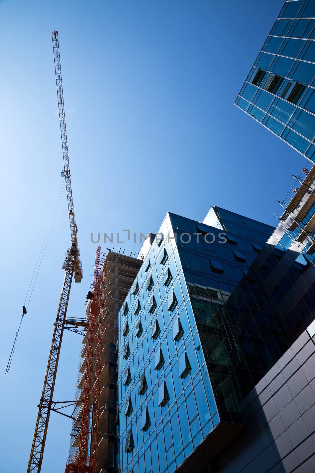 crane over a construction site of an office building