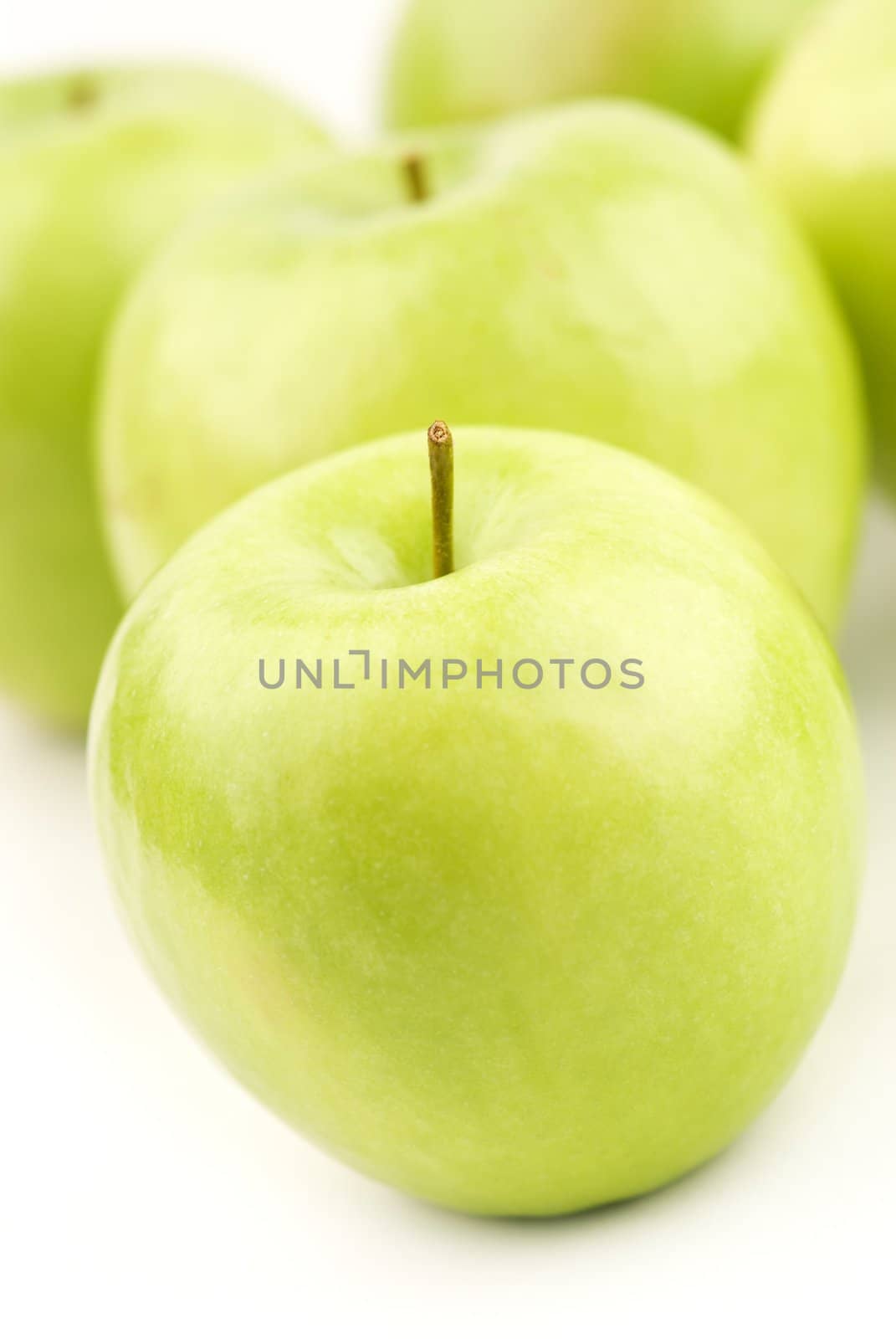 fruits in close up, focus point on nearest part of apple (stick)
