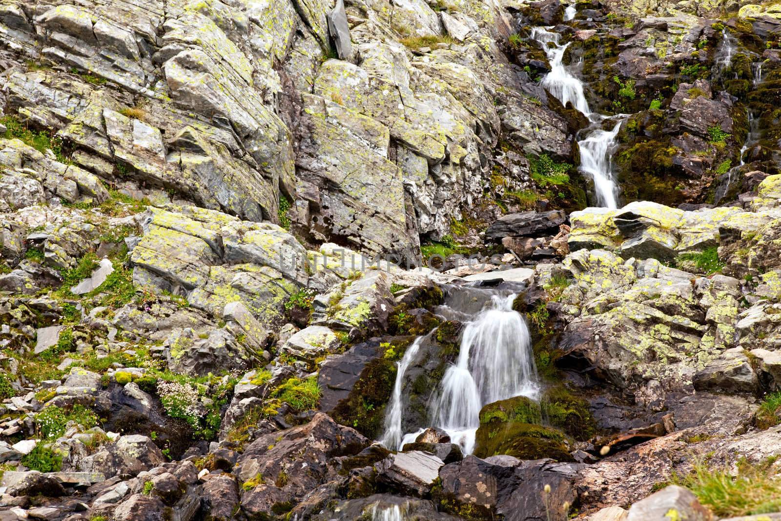 waterfall over rocks in motion in Rila mountains