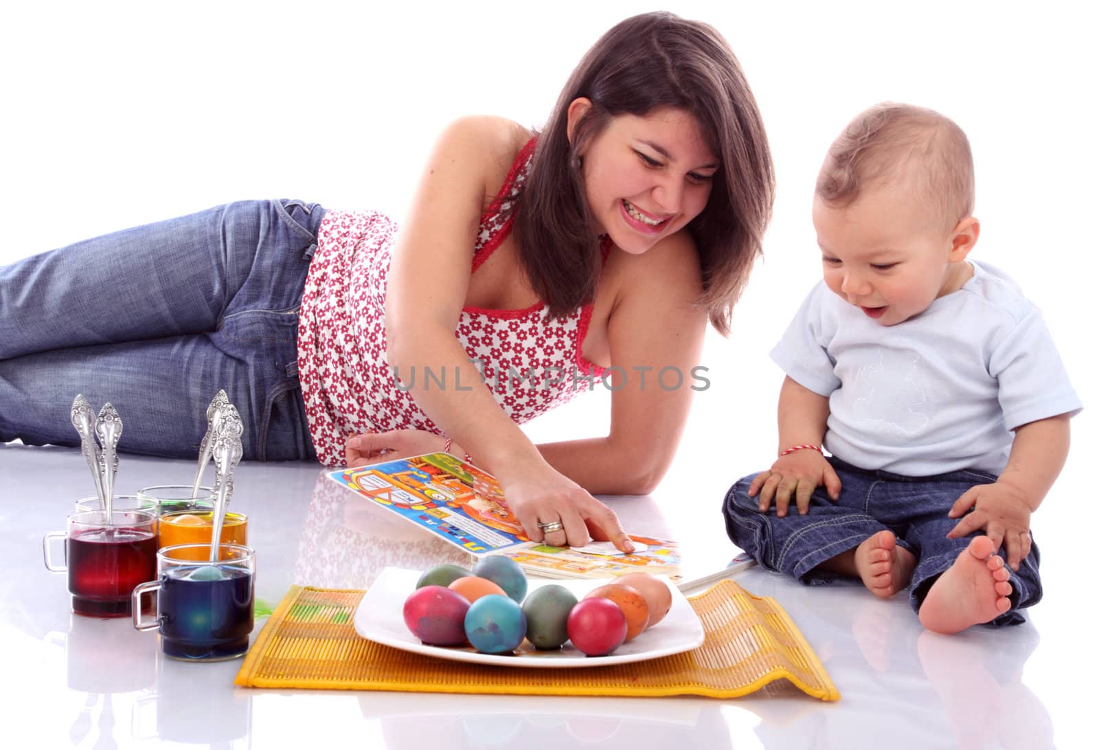 Mother and baby reading book