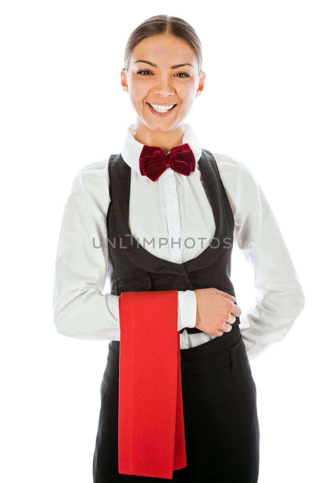 Beautiful waitress in uniform standing and smiling at camera