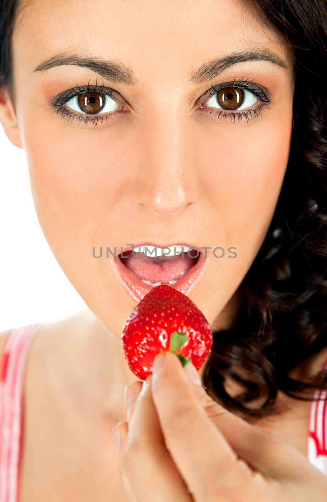 Woman eating strawberry by vilevi