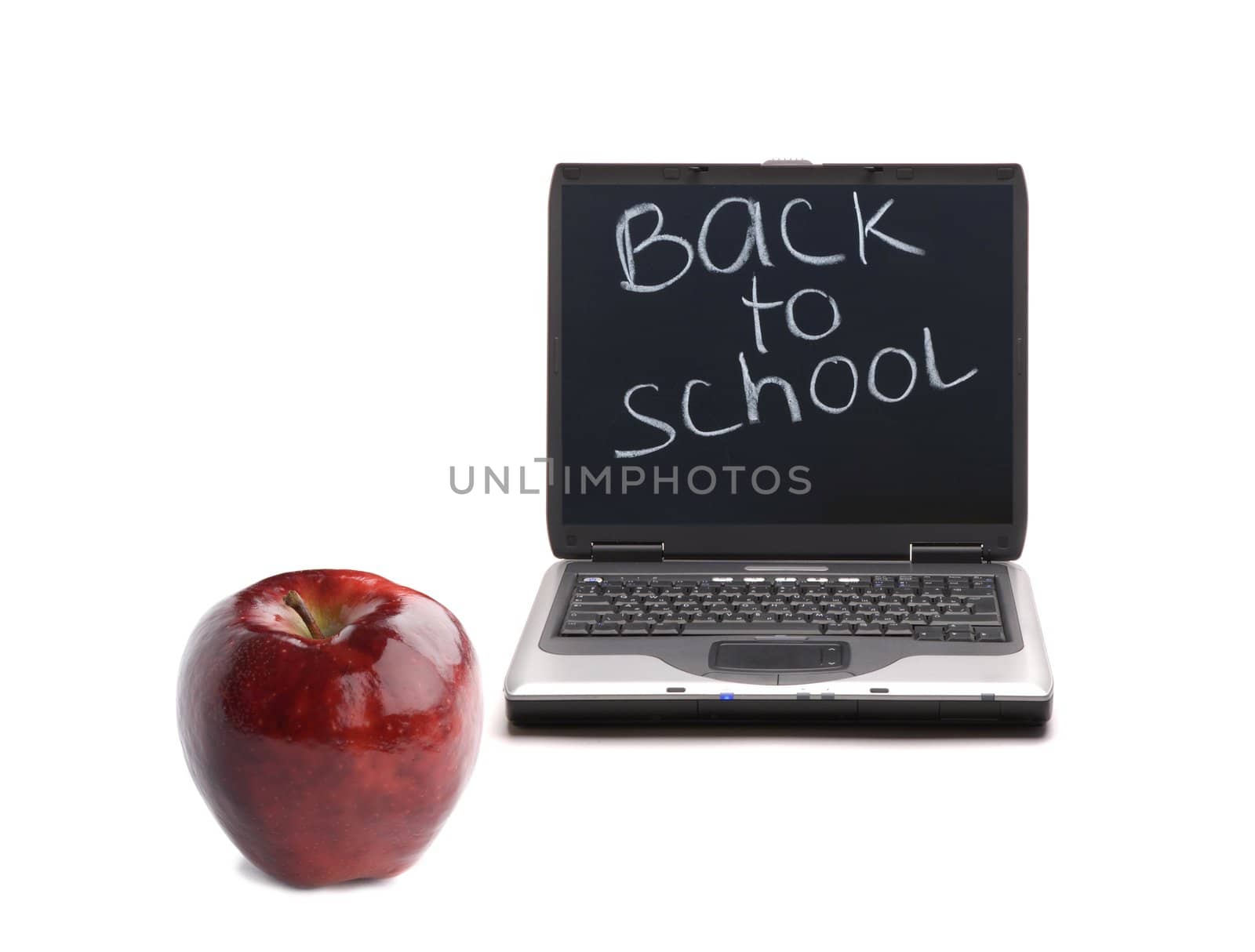 education concept with red apple and laptop