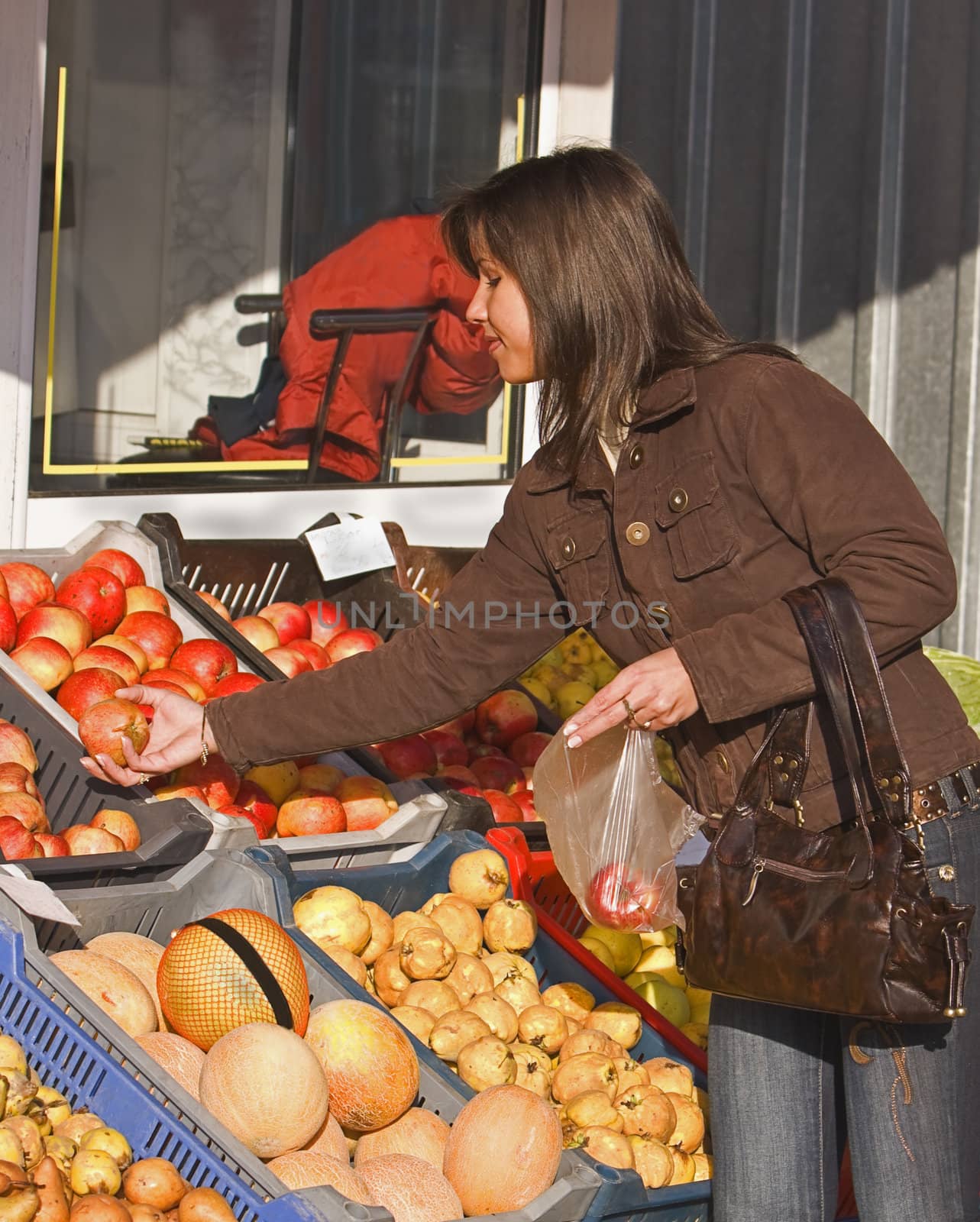 Woman buying fruits by RazvanPhotography