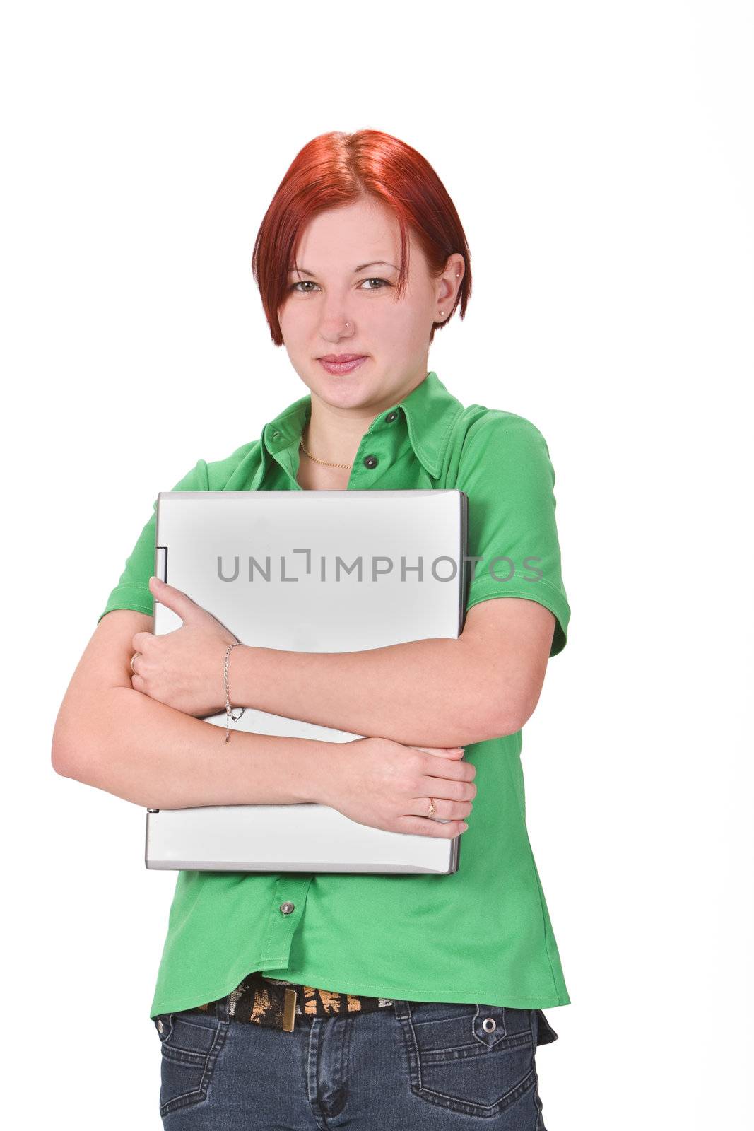 Redheaded girl student hugging her laptop.Shot with Canon 70-200mm f/2.8L IS USM