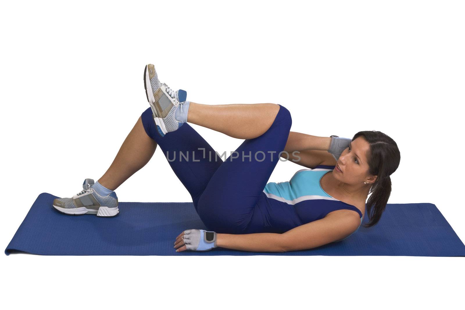 Young active woman doing a fitness exercise 