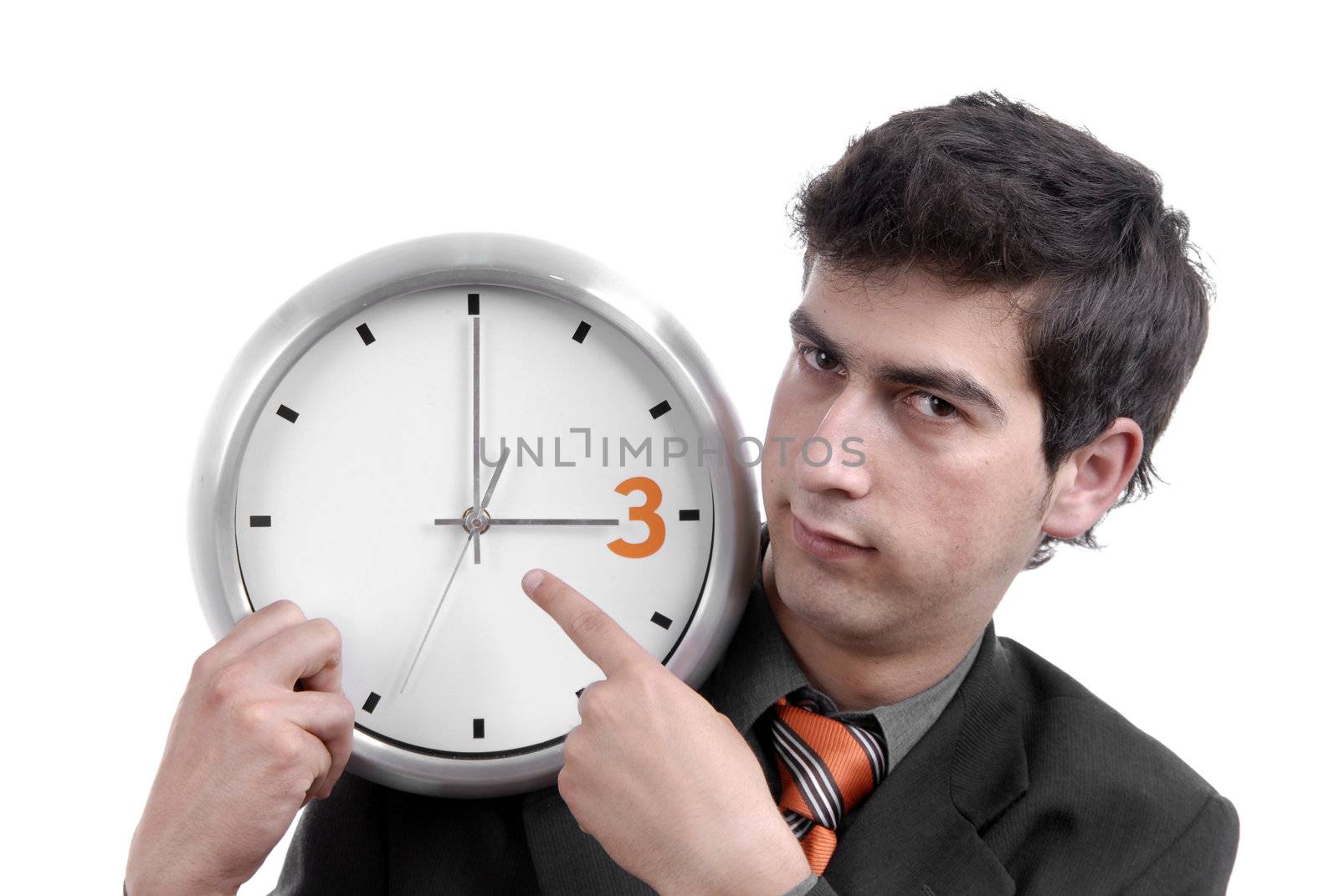 young handsome business man holding a clock