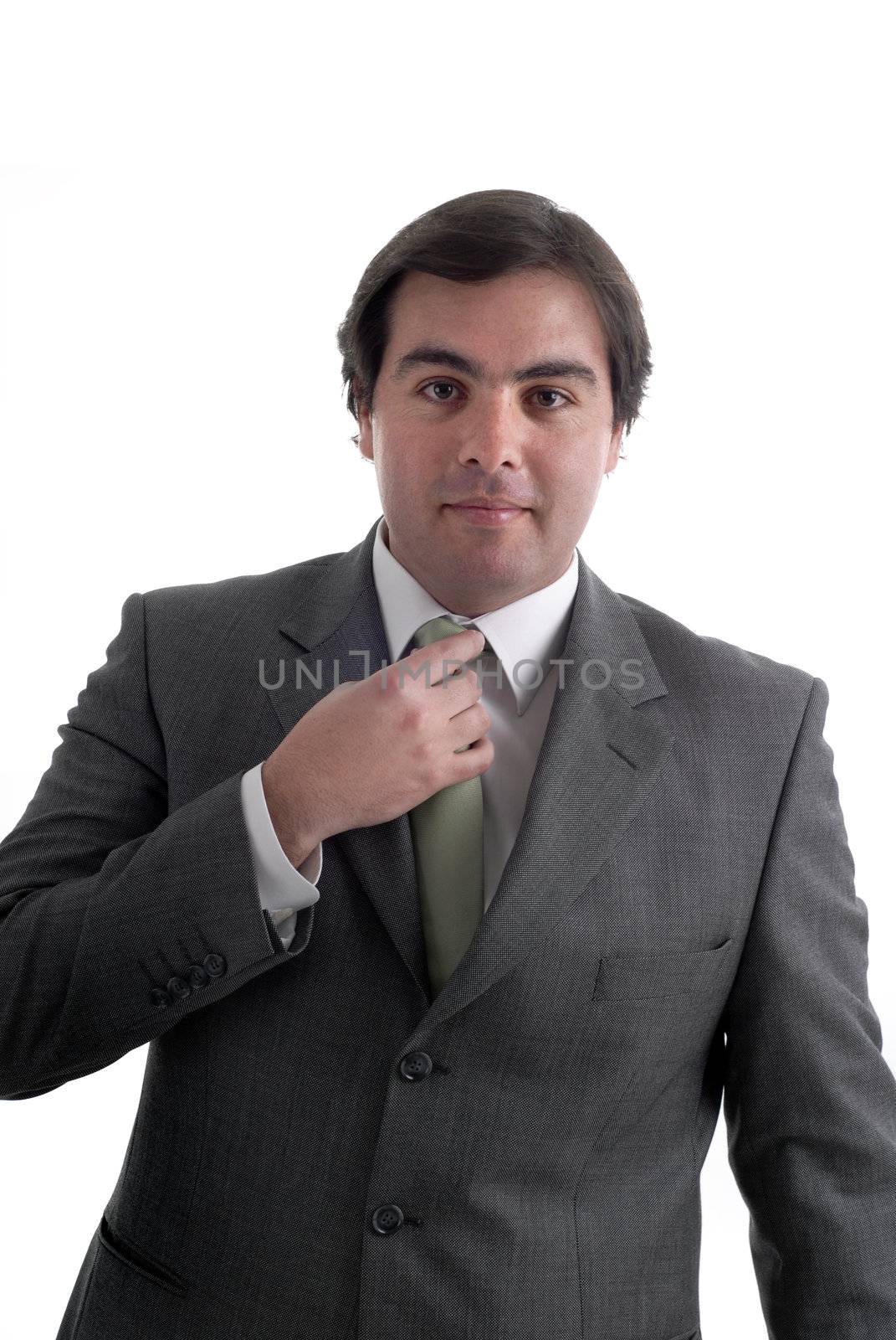 Business man Adjusting His Tie isolated on white