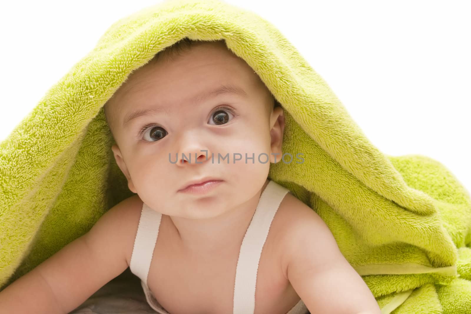 beautiful baby with a towel over your head
