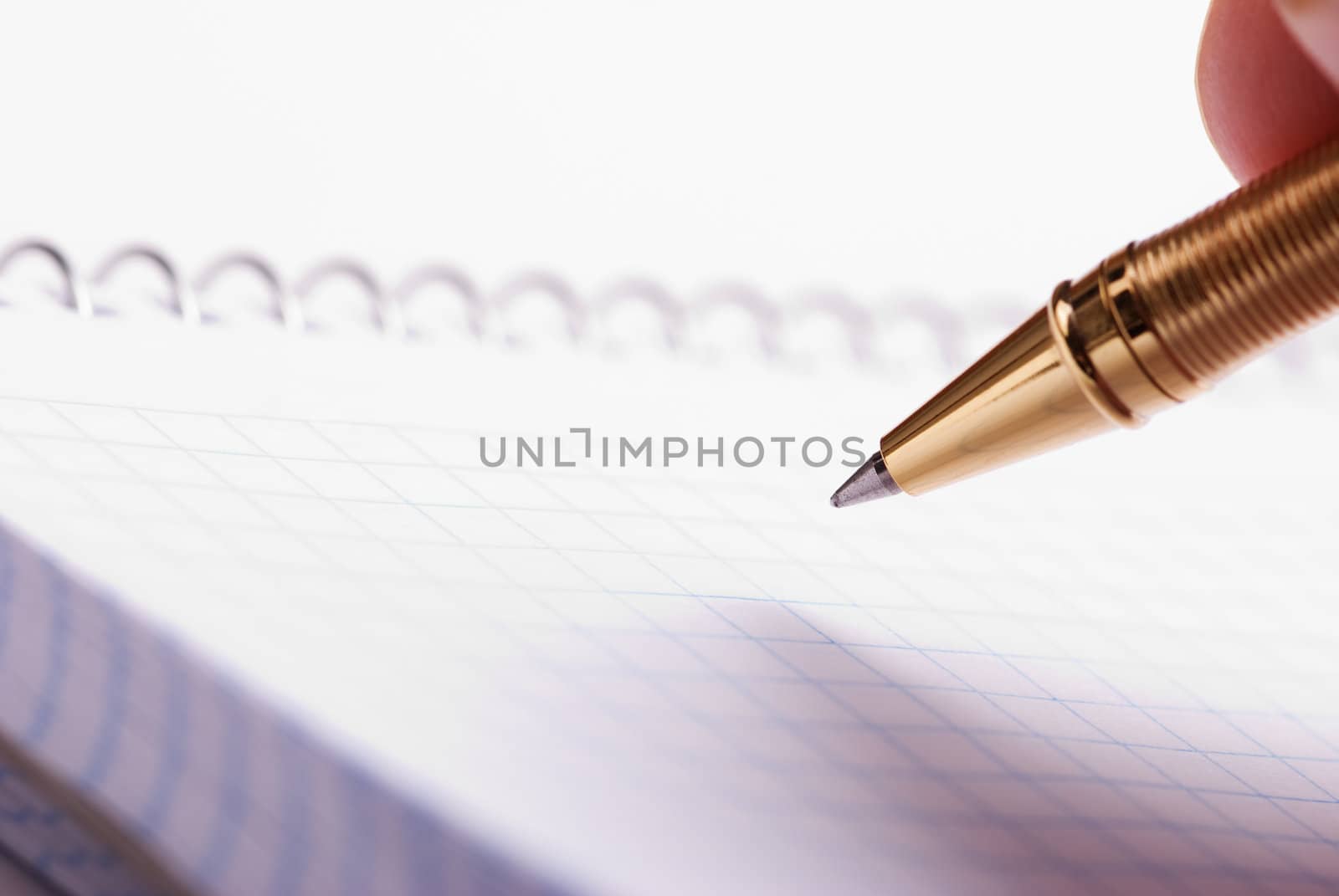 selective focus point on part of golden pen