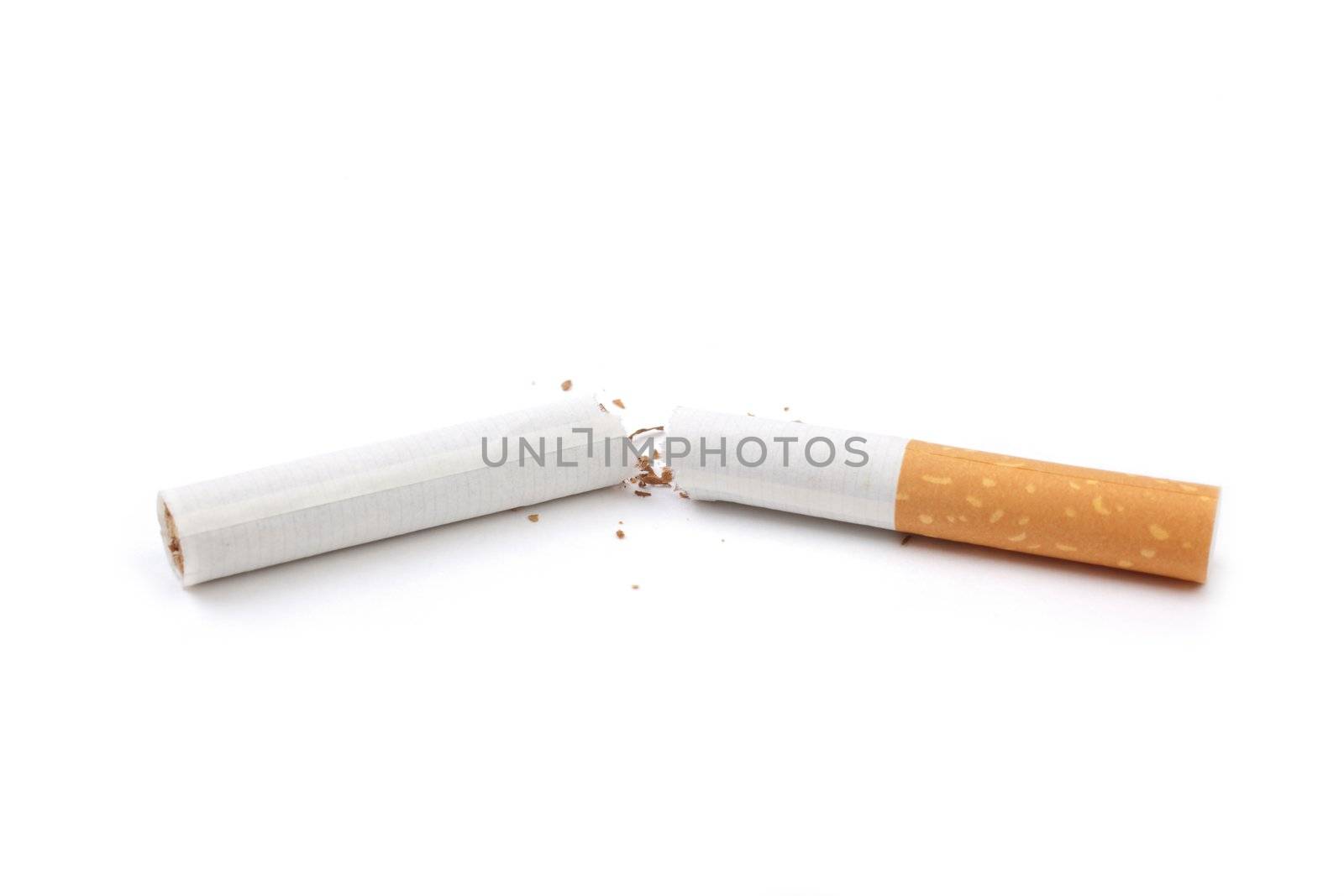 broken cigarette isolated on white background, focus on center