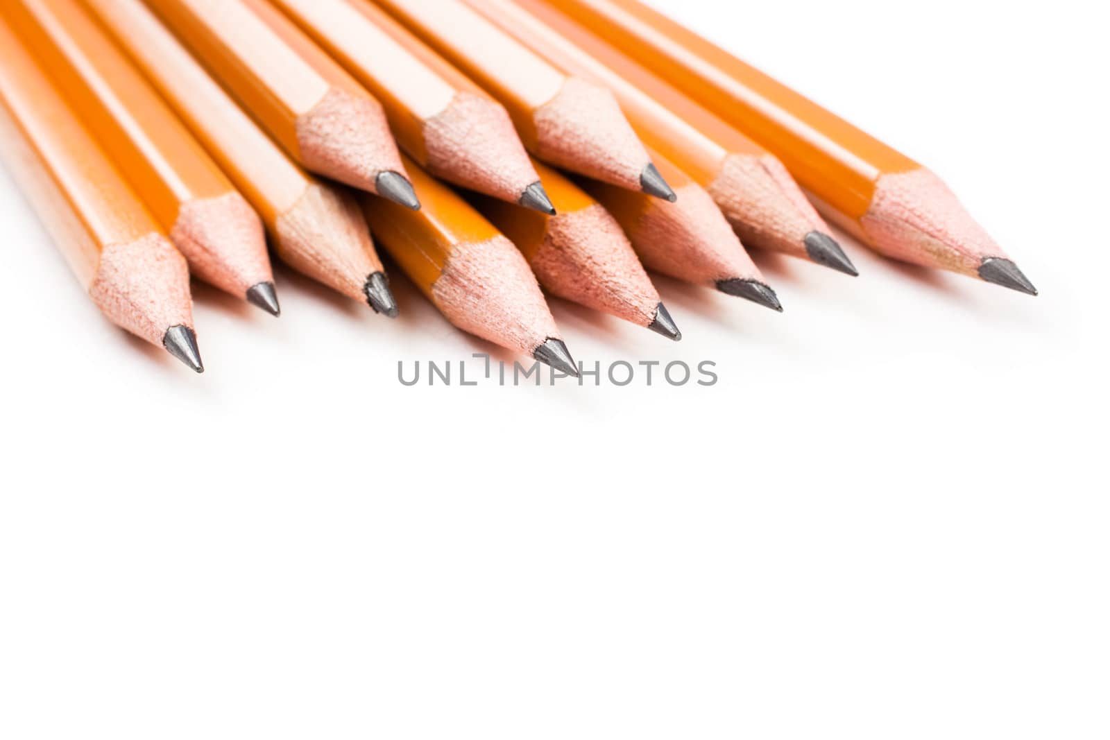 isoleted on white background, selective focus on nearest parts of pencils