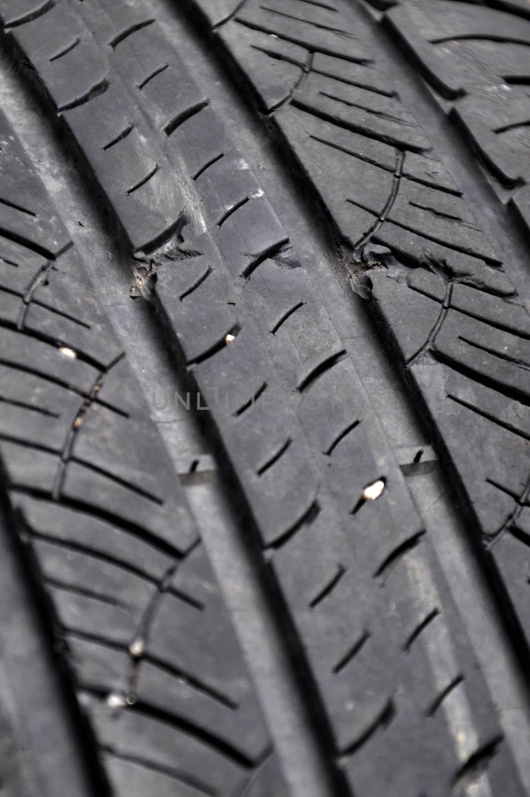 Close up view of damaged tire tread