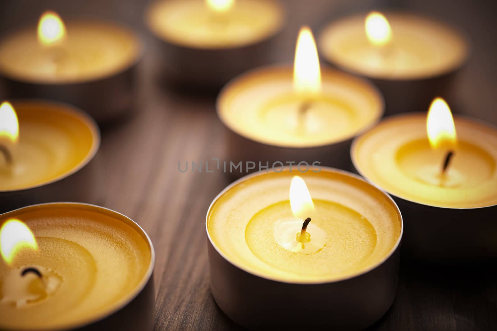 spa or romantic concept with some small candles, selective focus on nearest