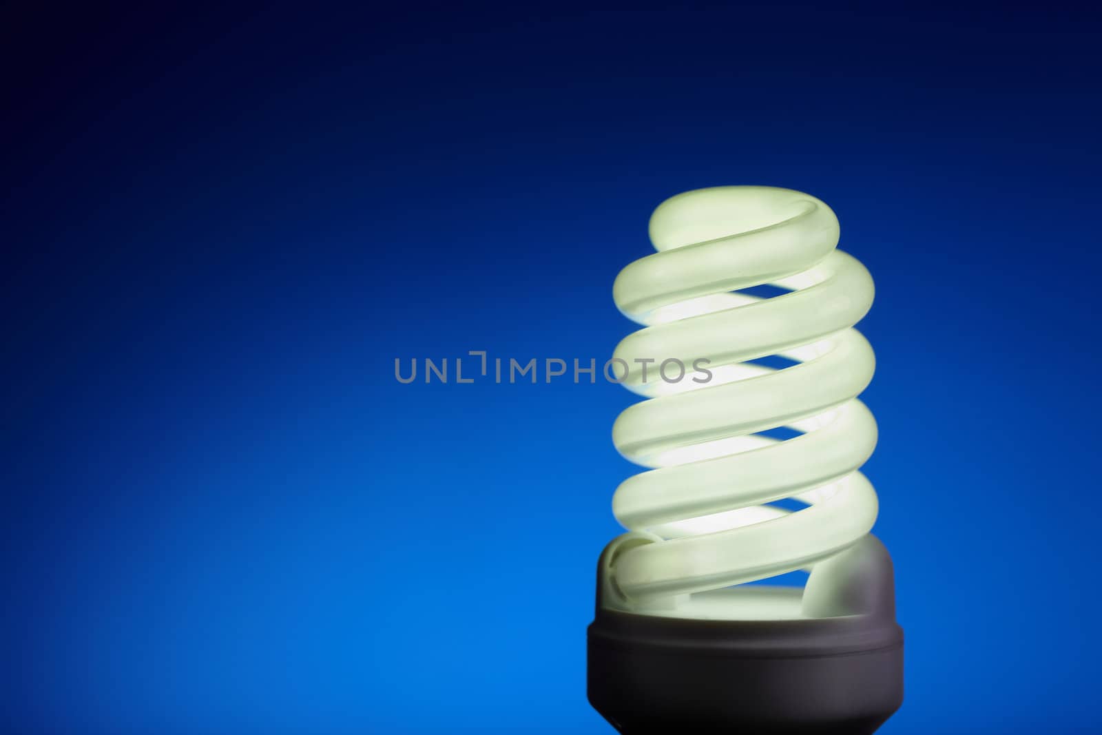 energy concept on blue background, selective focus