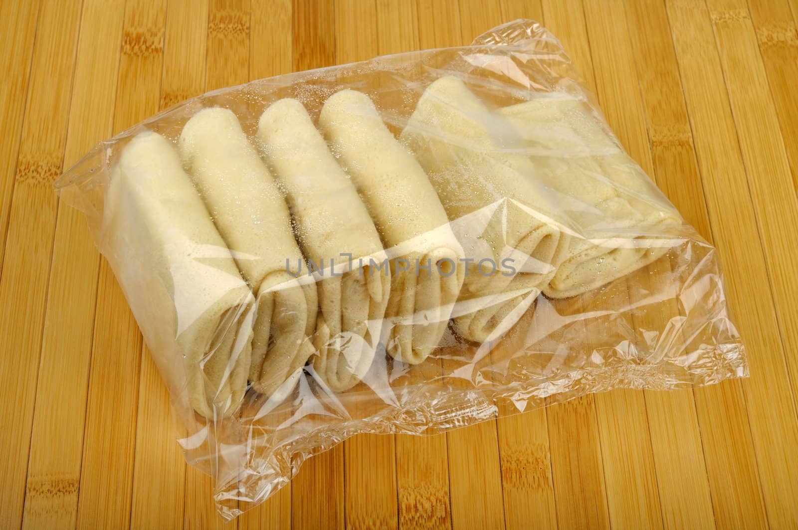 package frozen pancakes on a wooden table