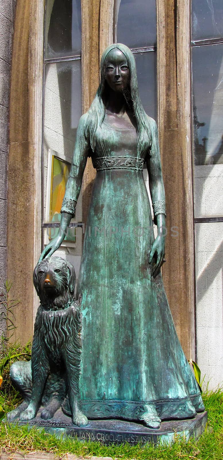 Gothic girl statue with a dog