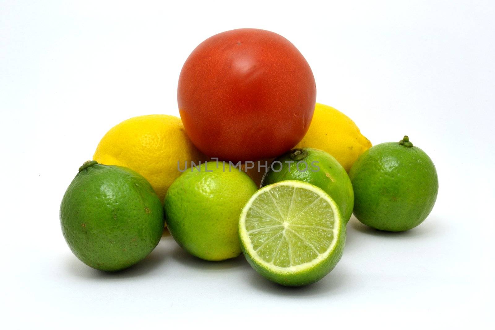 The fresh fruits over the white background