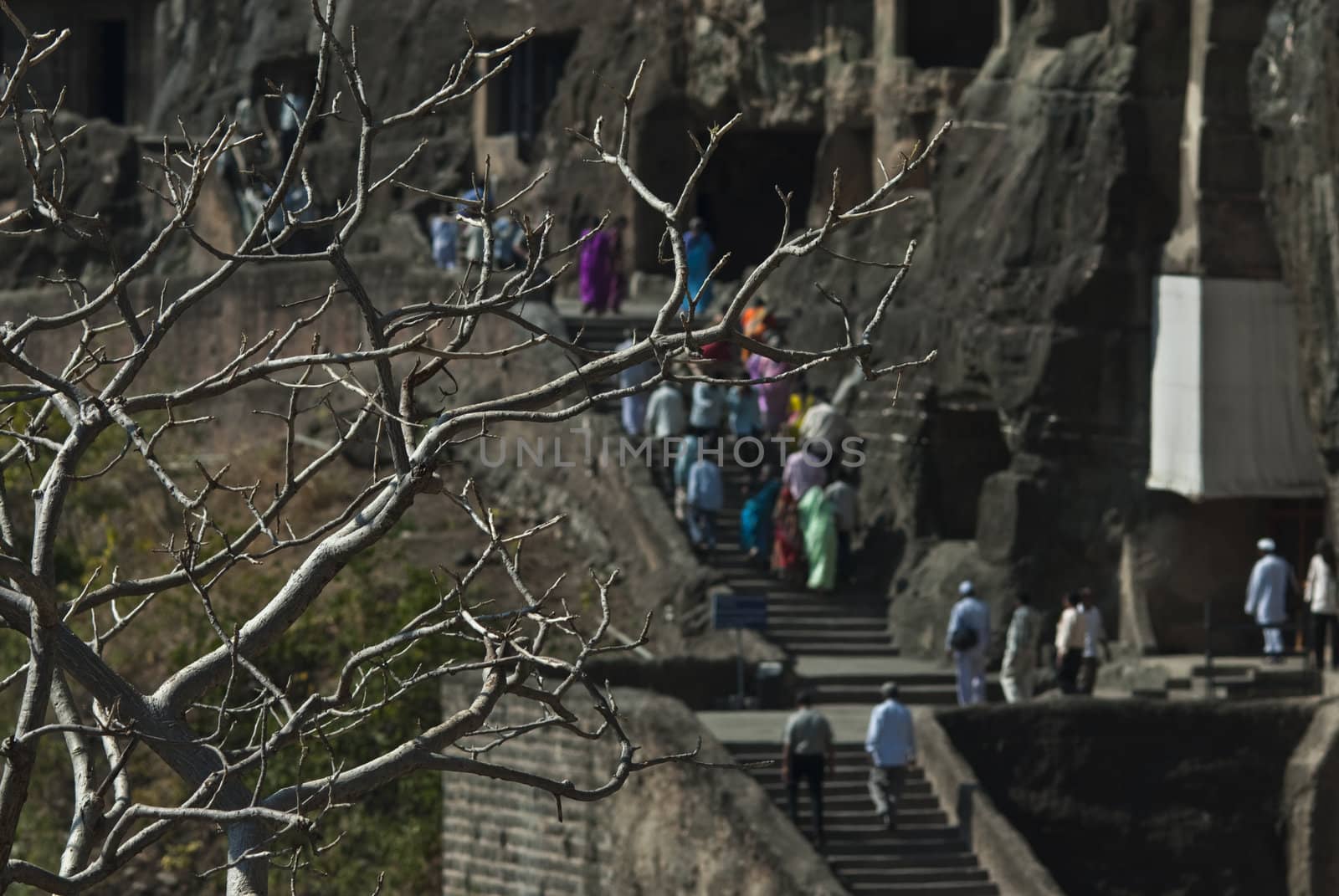 Tourists visiting historical temple in Ajanta, India