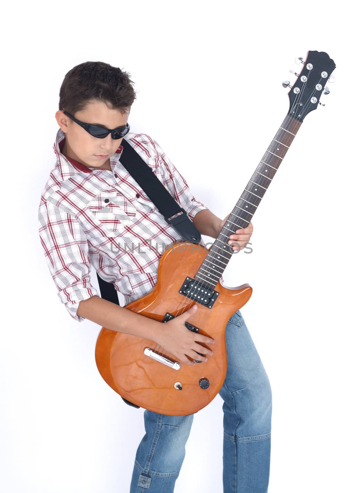 boy playing with a guitar over white