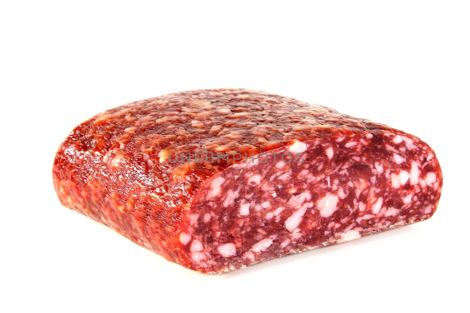 a piece of salami on a white background