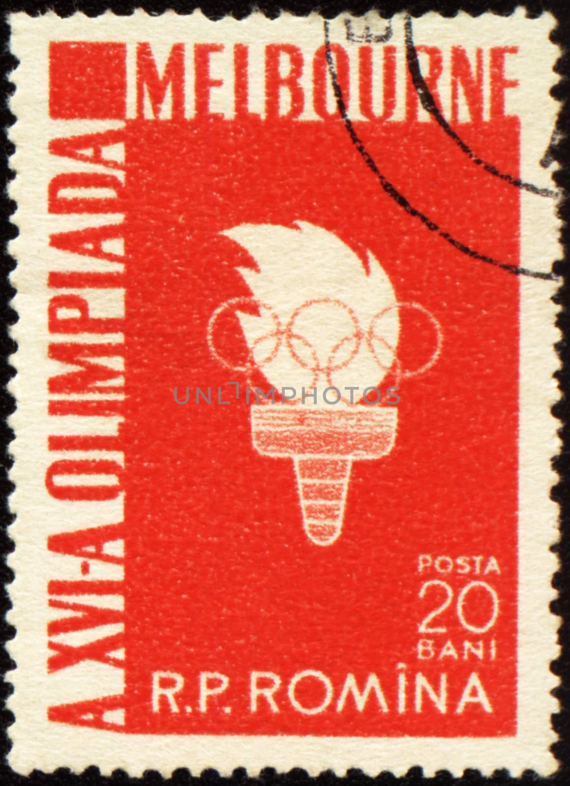 ROMANIA - CIRCA 1956: A post stamp printed in Romania shows Olympic torch with flame, devoted to Olympic games in Melbourne, series, circa 1956